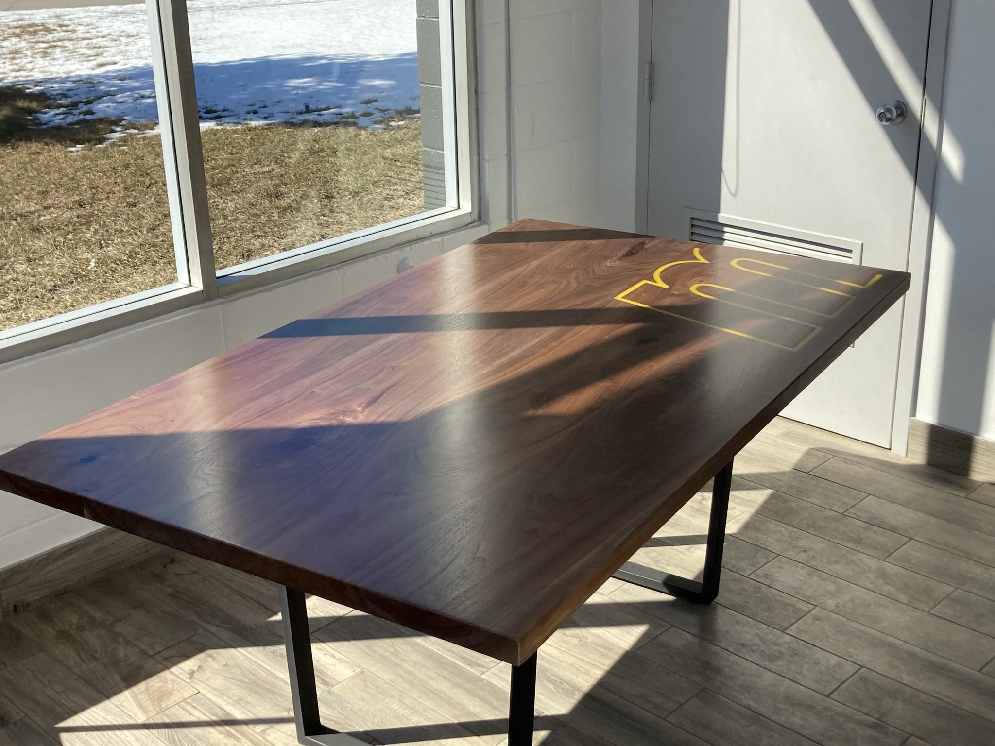 Gallery 12 Custom walnut table with epoxy inlay by RInes Design